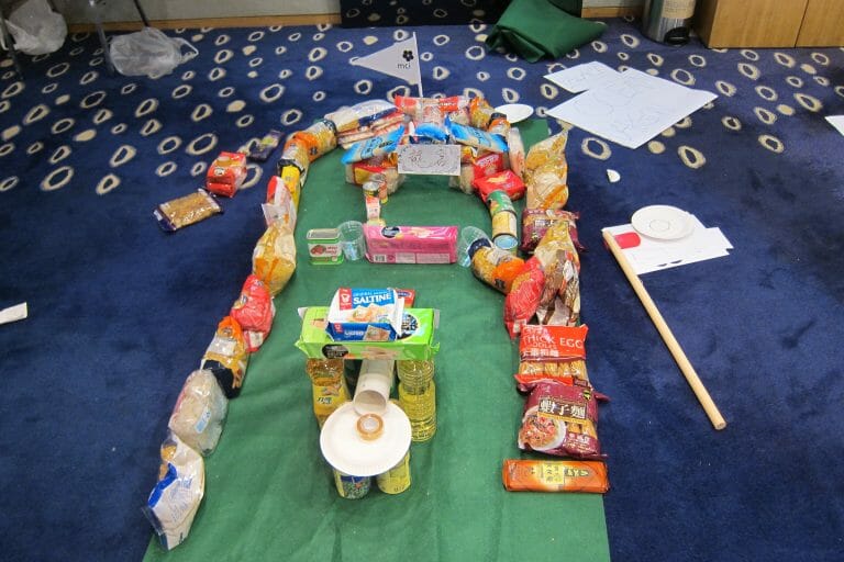 A sustainable pitch and putt course built out of household materials during an Orangeworks charity team building activity.