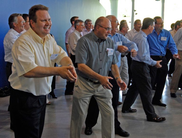 Delegates of One Voice, one of Orangeworks conference energisers, getting into the zone combining their dance moves with vocals.