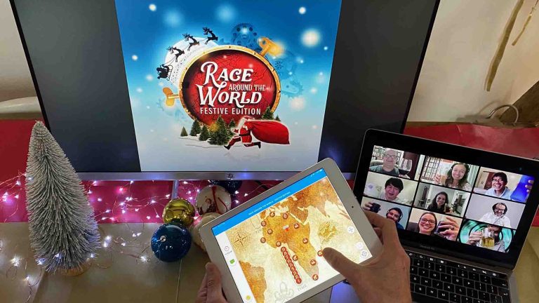 Race Around the World Festive set up of a laptop and computer | Orangeworks Remote Team Building Activities