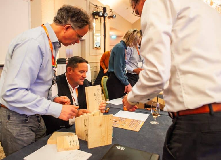 Delegates building a bird box as part of their CSR based Green Game team building challenge with Orangeworks.
