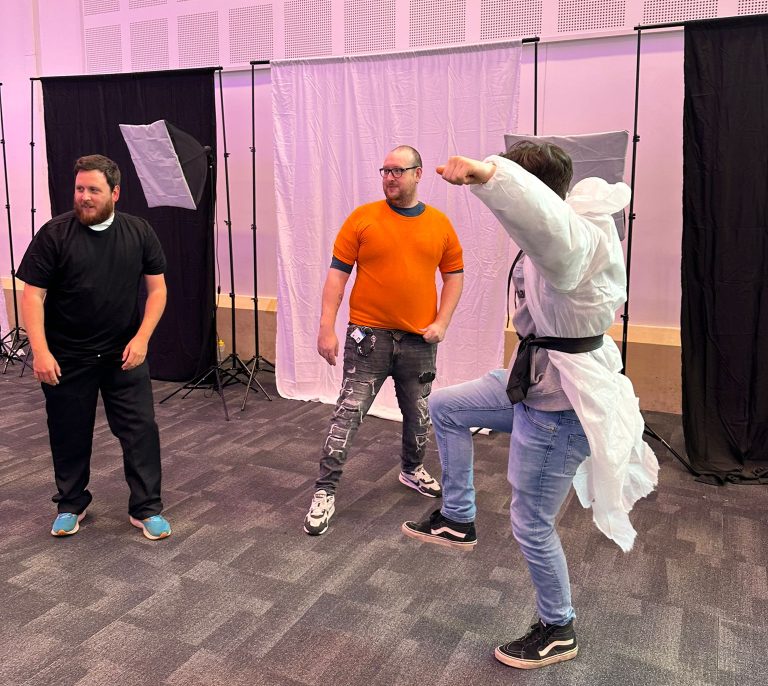 Delegates dressing up in costumes and taking selfies as part of Orangeworks team bonding activity called Picture Perfect.