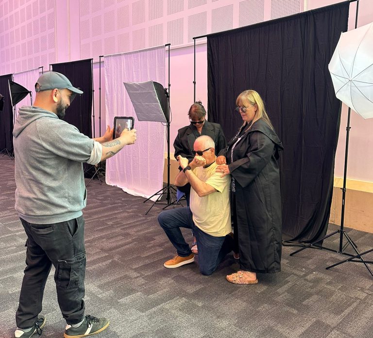 Delegates dressing up in costumes and taking selfies as part of Orangeworks team bonding activity called Picture Perfect.
