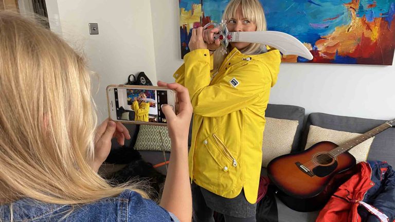 Delegates dressing up in costumes and taking selfies as part of Orangeworks team bonding activity called Picture Perfect.