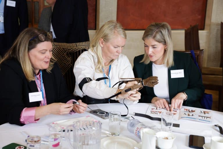 Delegates participating in Give a Hand, a charity team engagement activity by Orangeworks in partnership with Lightbulb.