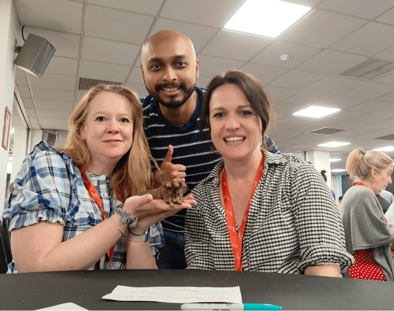 Delegates participating in Give a Hand, a charity team engagement activity by Orangeworks in partnership with Lightbulb.