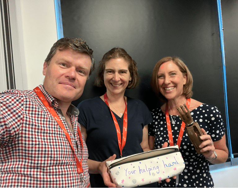 Delegates participating in Give a Hand, a charity team engagement activity by Orangeworks in partnership with Lightbulb.