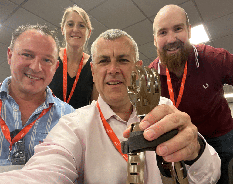 Delegates participating in Give a Hand, a charity team engagement activity by Orangeworks in partnership with Lightbulb.