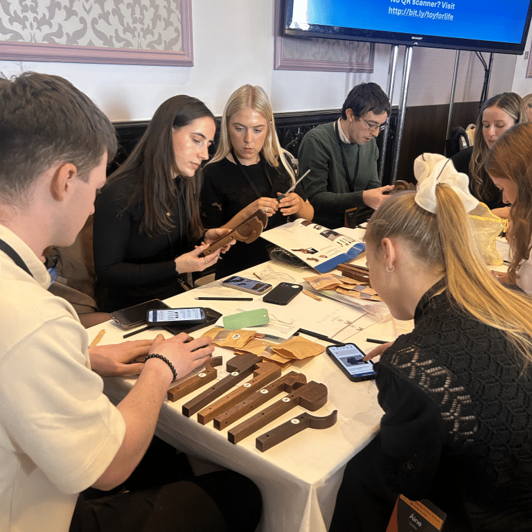 Delegates taking part in Toy For Life, a CSR team engagement activity run by Orangeworks