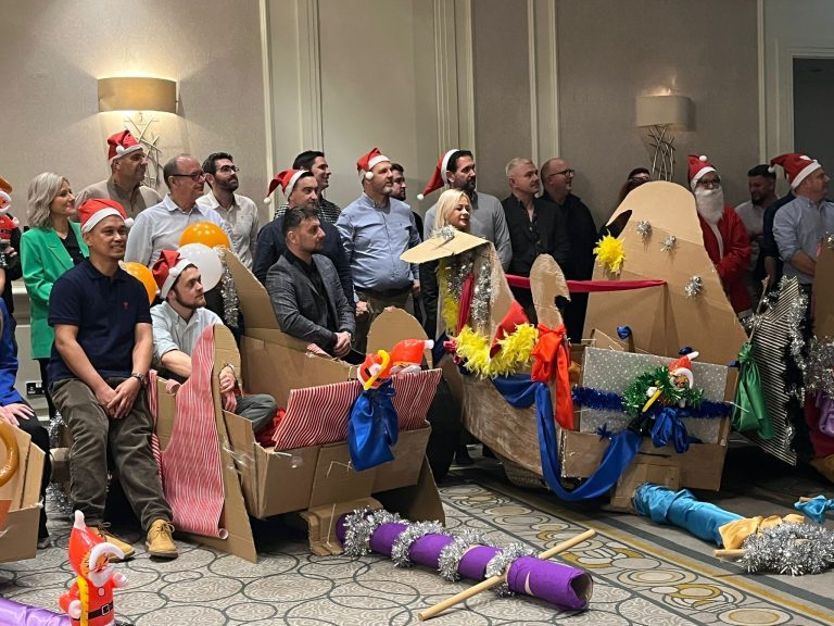 Delegates enjoying Orangeworks Christmas themed team bonding activity called Flat out Sleigh Ride.