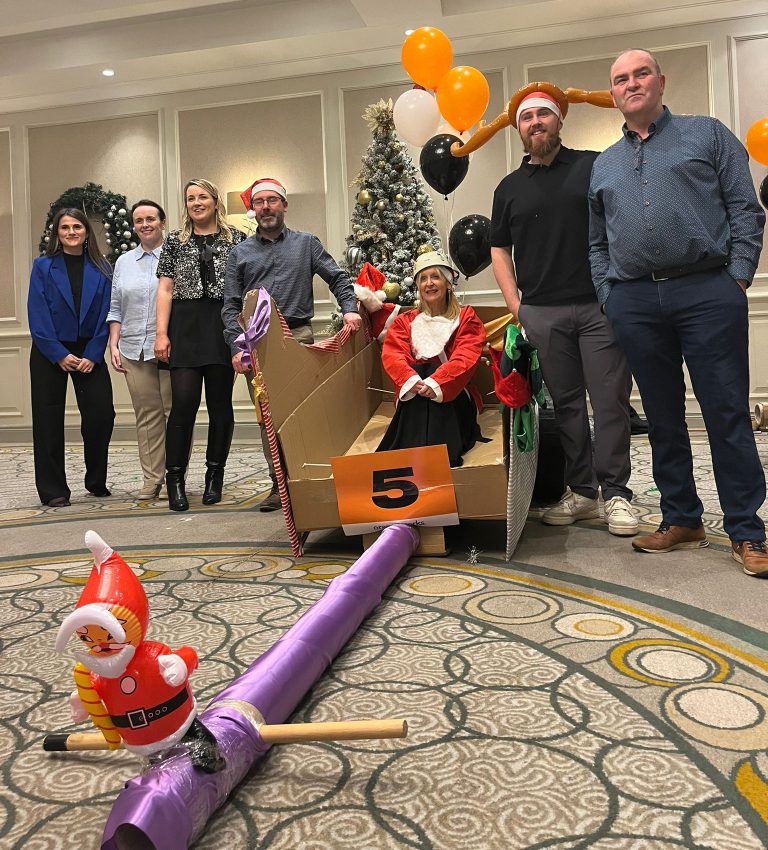 Delegates enjoying Orangeworks Christmas themed team bonding activity called Flat out Sleigh Ride.