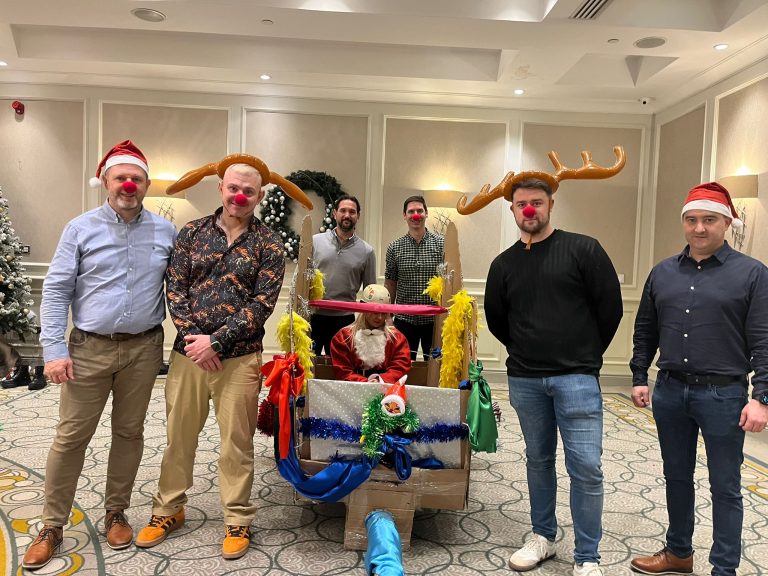Delegates enjoying Orangeworks Christmas themed team bonding activity called Flat out Sleigh Ride.