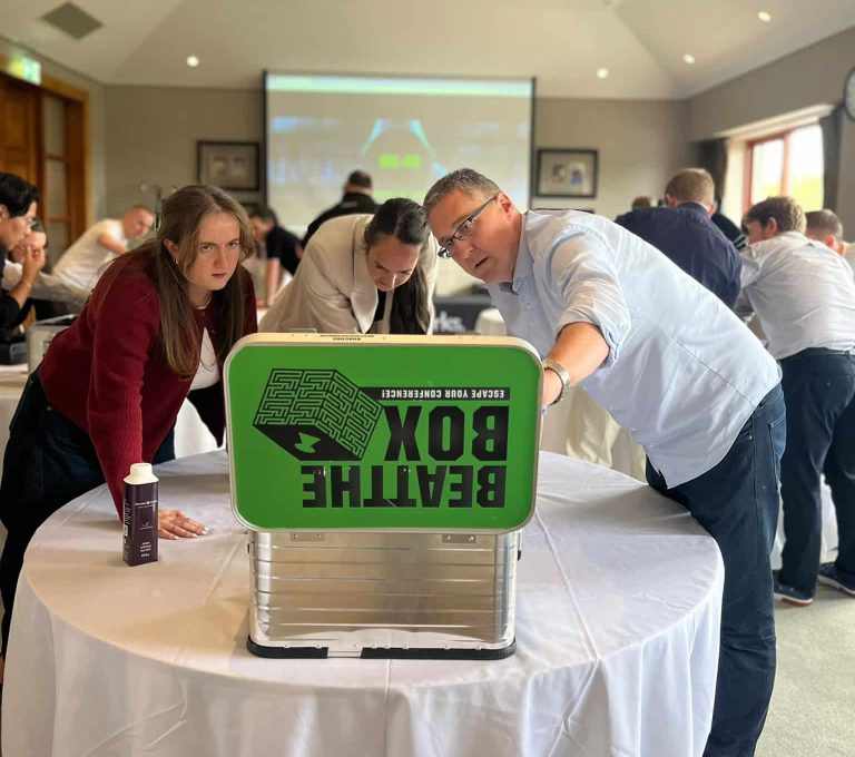 Delegates participanting in Orangeworks corporate team activity called Beat the Box.