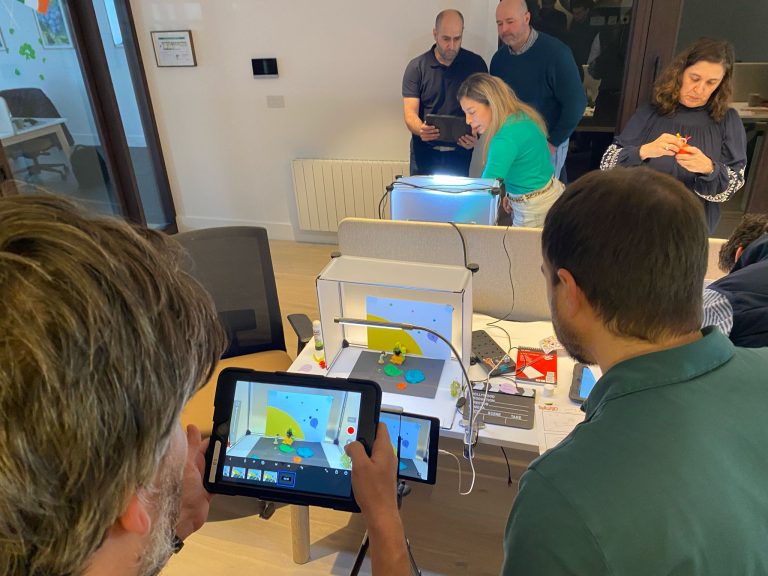 Delegates working together on their stop motion animation as part of their team building workshop provided by Orangeworks.