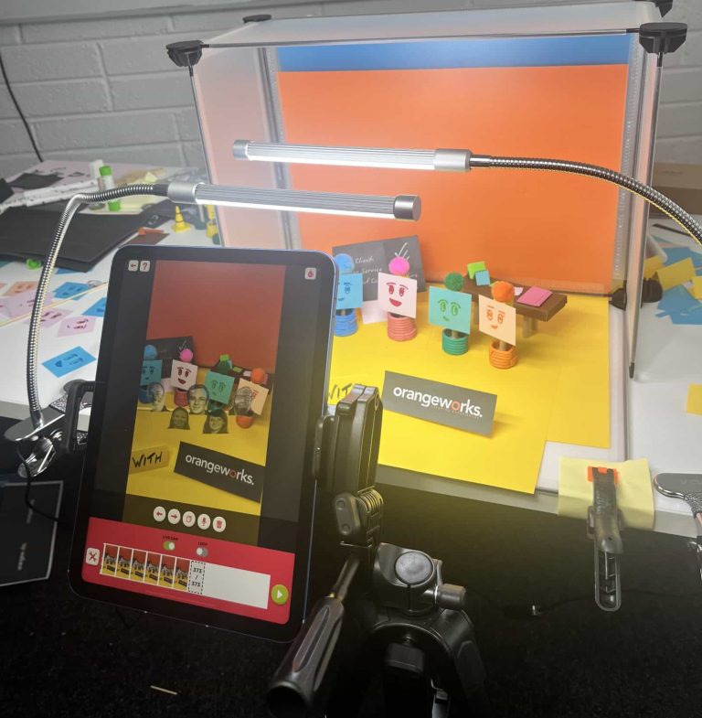 Delegates working together on their stop motion animation as part of their team building workshop provided by Orangeworks.
