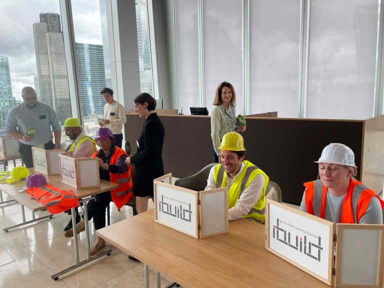 Small team working together during an Orangeworks iBuild challenge.